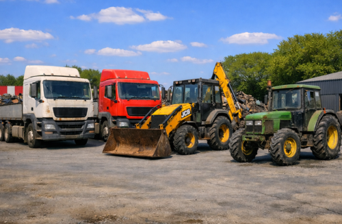 Photo of a scrap yard with HGVs, diggers and tractors