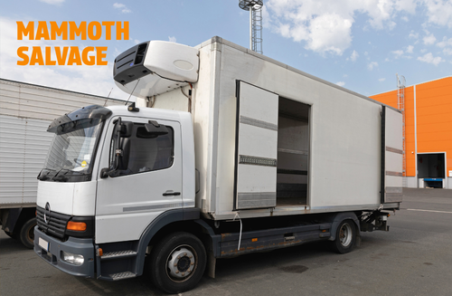 Photo of a white refrigerated vehicle with a graphical overlay of text saying MAMMOTH SALVAGE