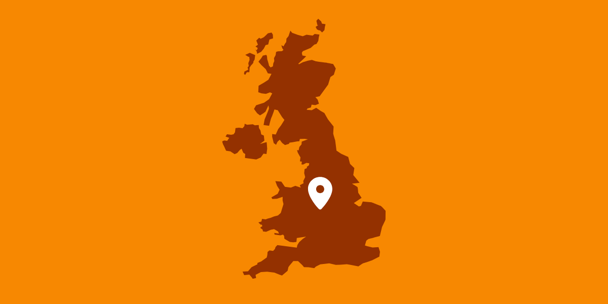 Graphic of a brown UK map and a white map marker over Birmingham with an orange background
