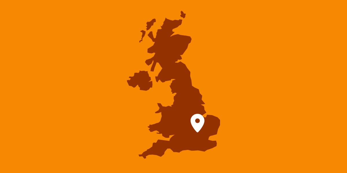 Graphic of a brown UK map and a white map marker over Luton with an orange background