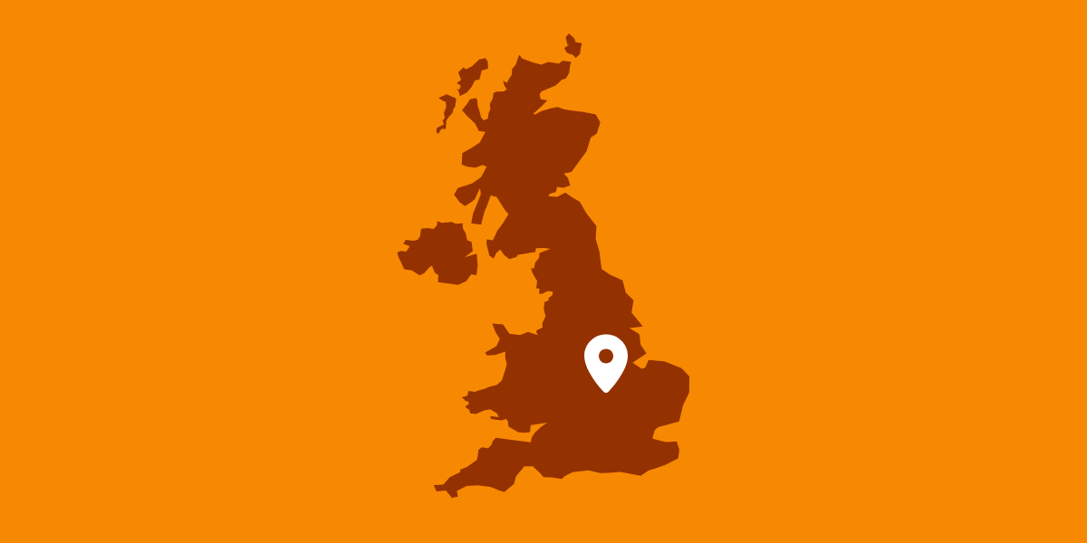 Graphic of a brown UK map and a white map marker over Northampton with an orange background